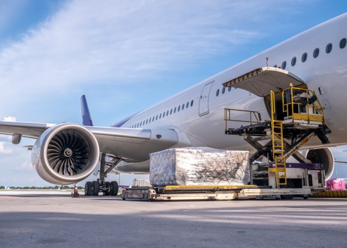 Air,Cargo,Logistic,Containers,Are,Loading,To,An,Airplane.,Air